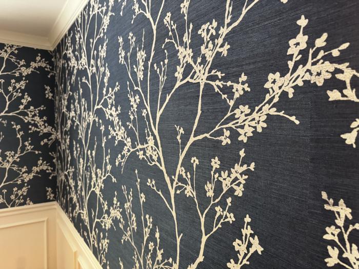 Close-up of navy grasscloth with cream branches
