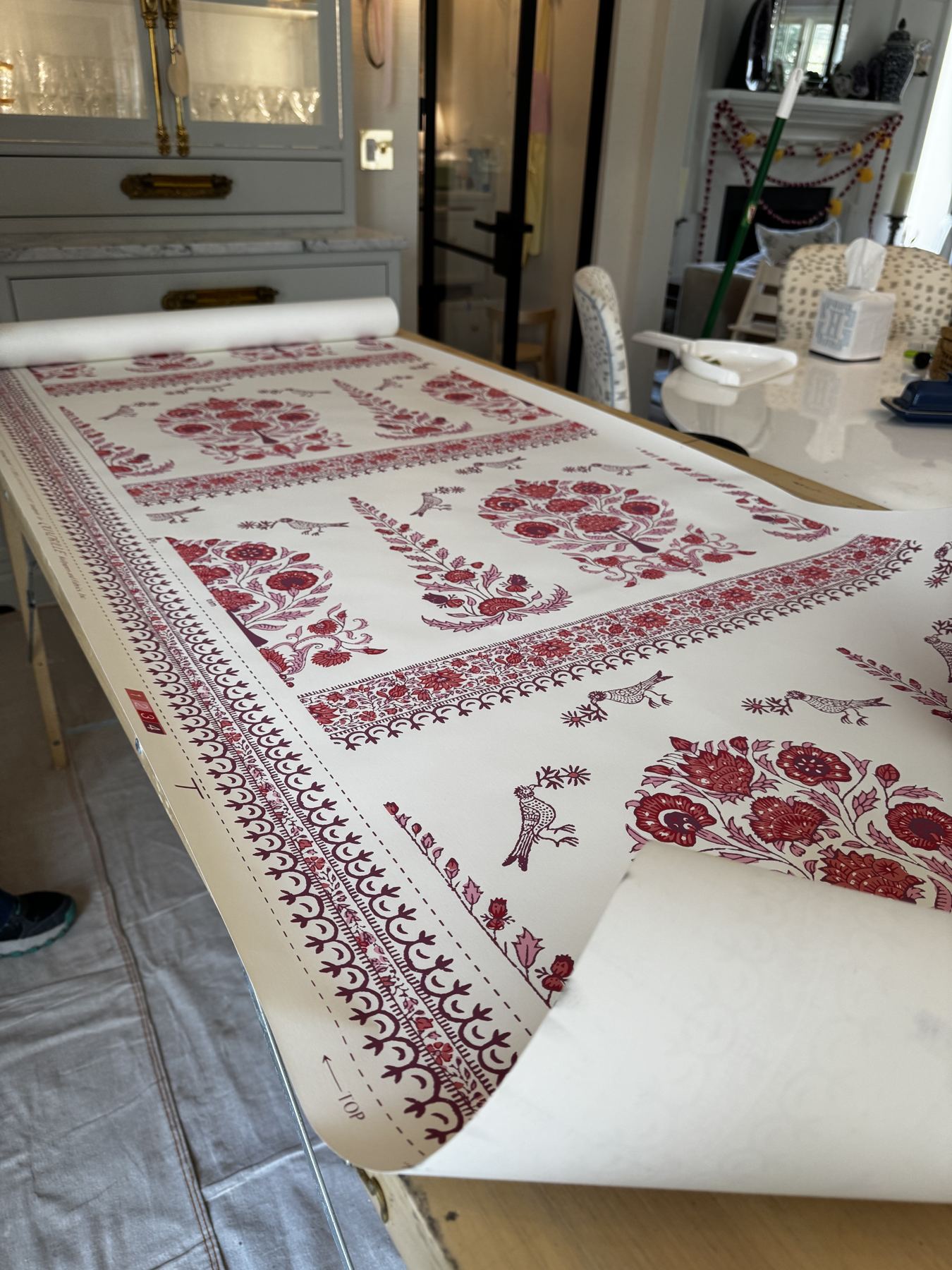 Red and white block-print paper on the work table